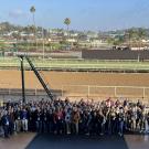 large group of veterinary students at horse track