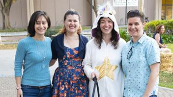 students and dog in costume