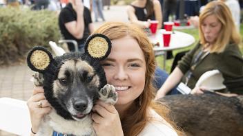 Student and dog in costume