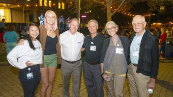 Dean with students and '69 alumni