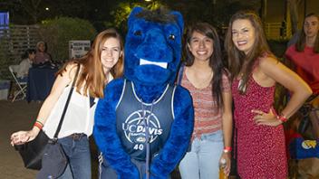 Gunrock posing with students