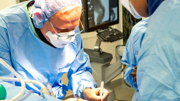 A close up of surgeons performing a procedure in the Advanced Veterinary Surgery Center.