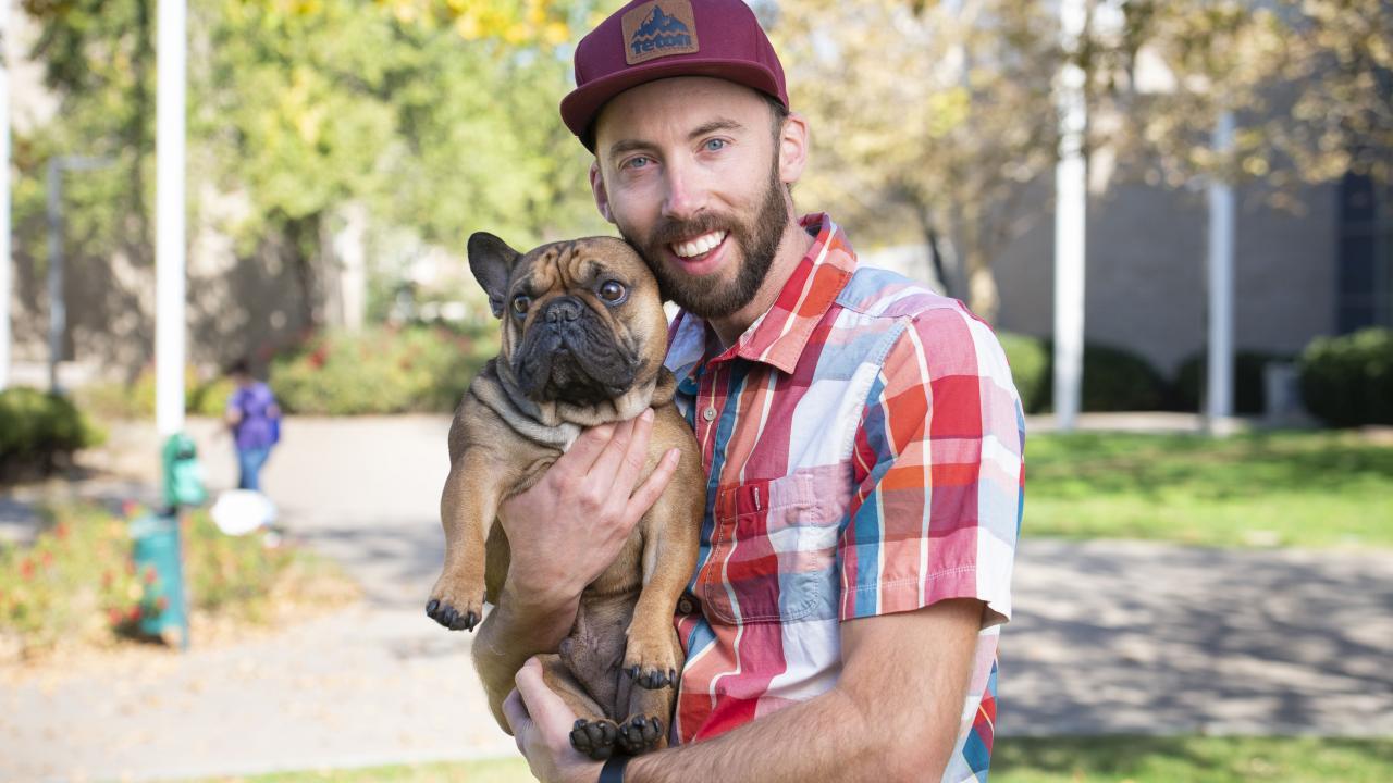 Barley, a French bulldog, And Rob, a human