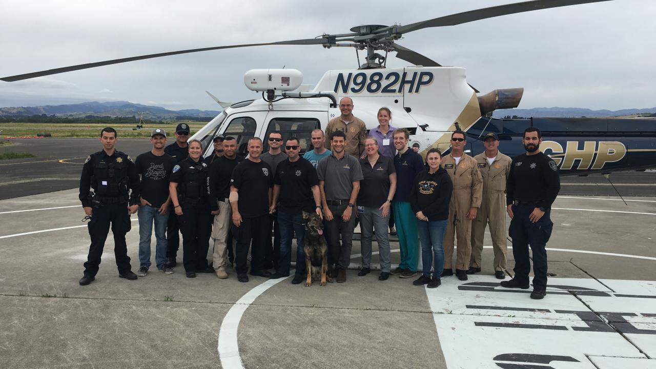 Police and UC Davis veterinarians with CHP helicopter