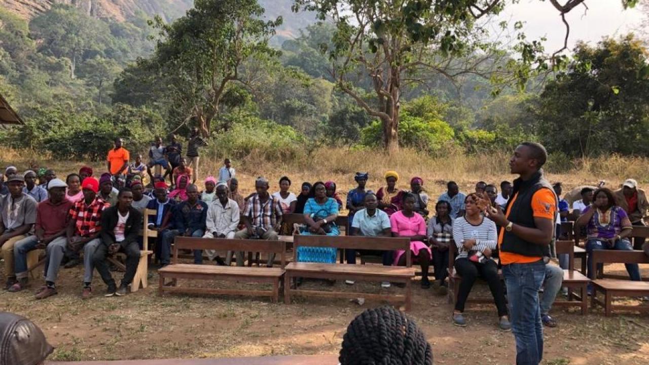 A community engagement meeting about Marburg virus in Kakoya village, Sierra Leone.