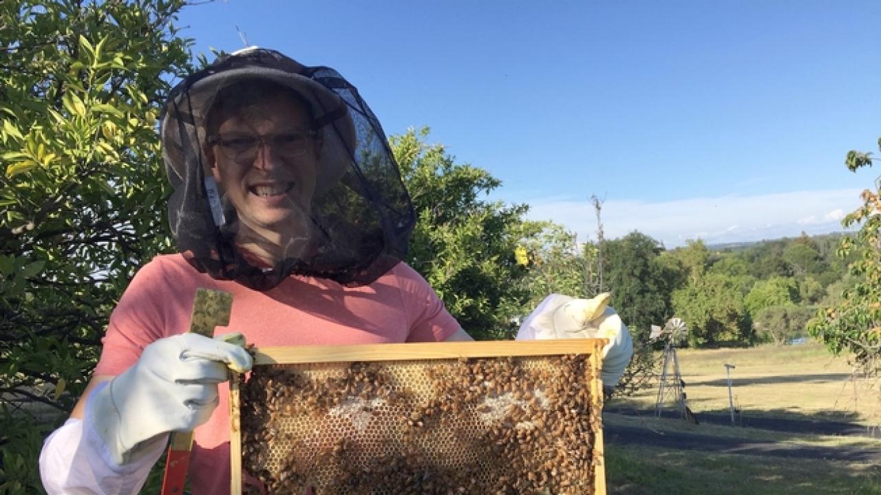 Dr. Jonathan Dear with his honeybees