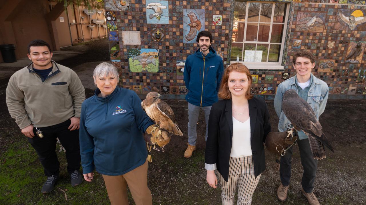 Assistant Professor of mechanical and aerospace engineering Christina Harvey (front row, right) and Professor Michelle Hawkins, director of the California Raptor Center at the UC Davis School of Veterinary Medicine (front, left), are establishing a new center for bird flight research with a grant from the U.S. Department of Defense.