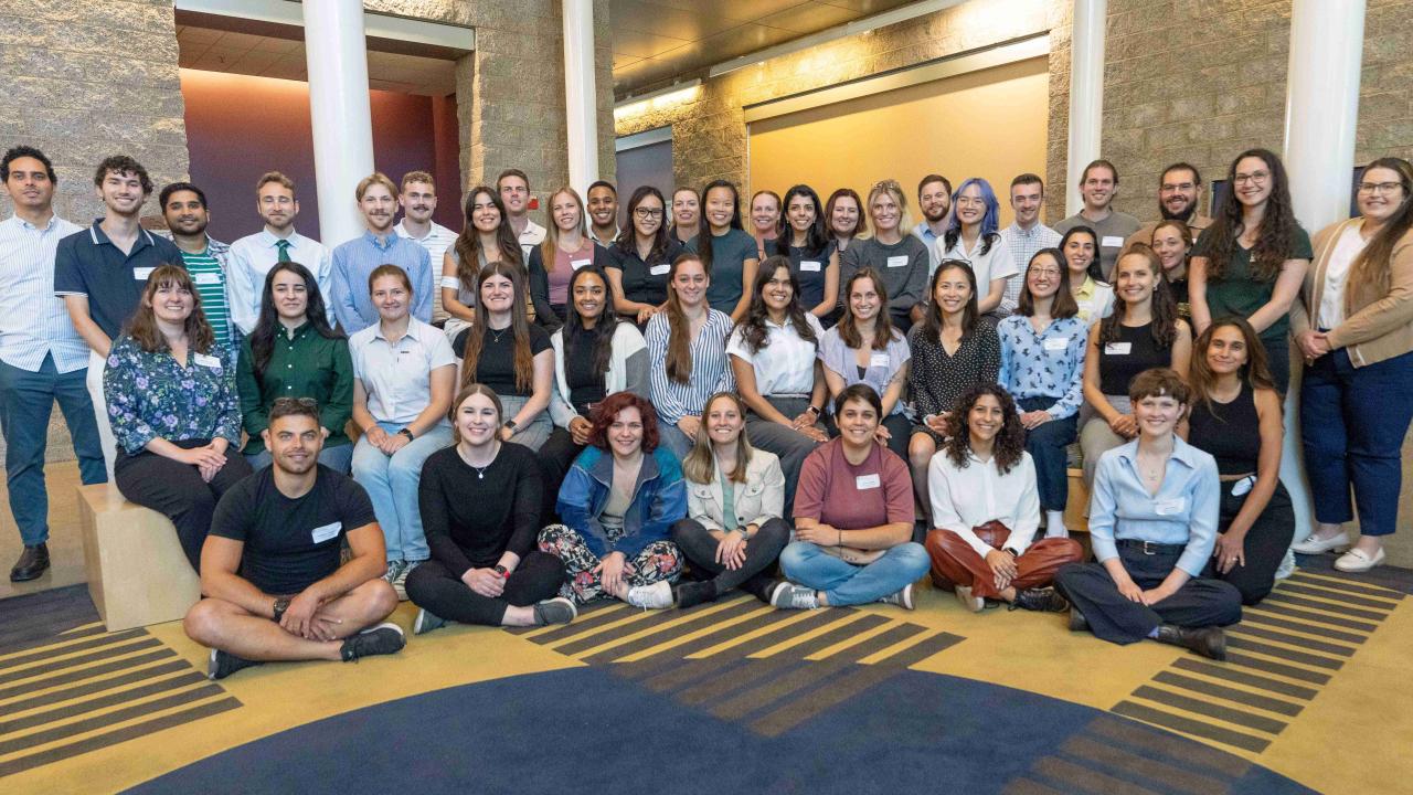 group photo of approximately 50 veterinarians