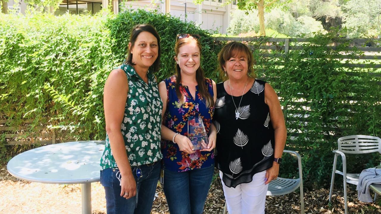 Kaitlin Zuwala, Internal Medicine Service referral coordinator, (center) won the 2021 Client Services/Administrative Staff Award, as part of the UC Davis veterinary hospital's annual staff awards.