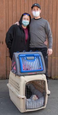 couple with their cats at the Davis PAW clinic