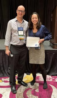 Dr. Boaz Arzi (left) and resident Dr. Janny Evenhuis (right) with her Original Research Best Oral Presentation Award.