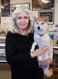 woman holding dog