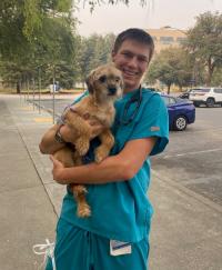 Craig Sutter holding Teddy