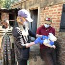 Cara Newberry, Class of 2022, sampling chickens in Tanzania.