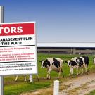 biosecurity sign on dairy farm