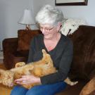 Cathy James and therapy cat, Molly.
