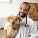 male student with dog