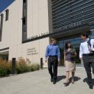 students walking outside the UC Davis Graduate School of Management building