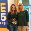 Dr. Heather Knych (left) receives her award from Dr. Joie Watson