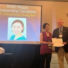 veterinarian receiving award at conference