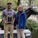 professor giving award to resident